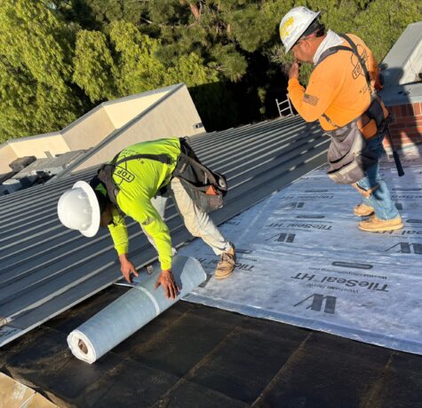 Top armor roofing team applying new two-ply TU43 SBS Underlayment system